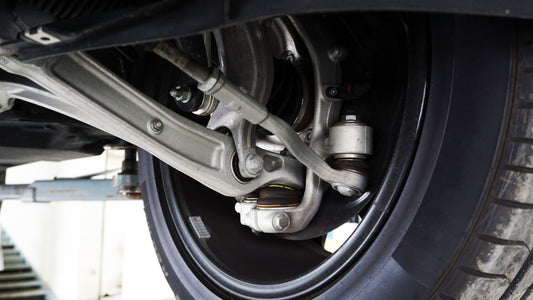 The Differences Between Ball Joint and Uniball Control Arms