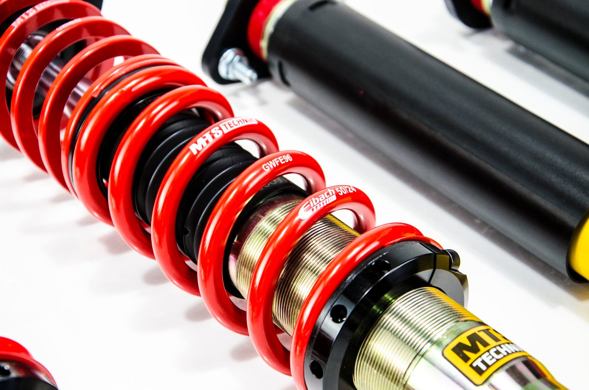 MTS Technik Street Series Coilover Kit - With Rear Top Mount, Gold Housing< 45mm Strut for 1985-1993 BMW 318i (E30) MTSGWBM105